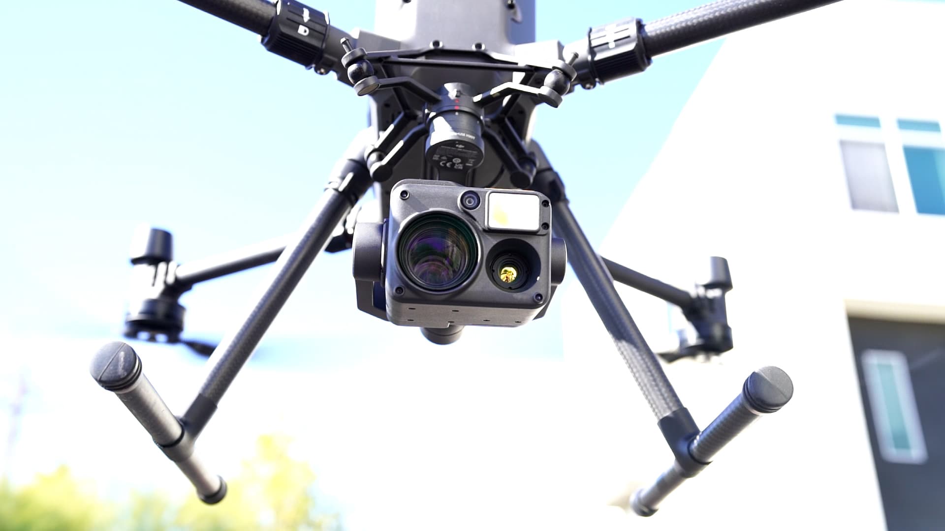 Inspection drone in flight viewed from below